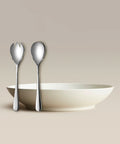 All Is Served Set silver fork and spoon beside a white bowl