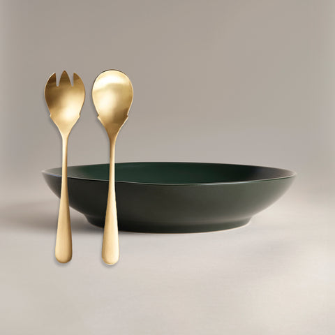 All Is Served Set includes a dark green bowl with two gold serving spoons resting in front.